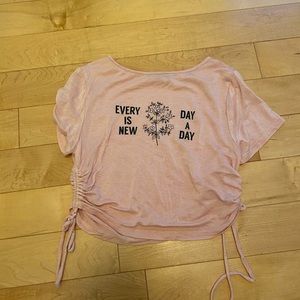 pink cropped tied at waist shirt